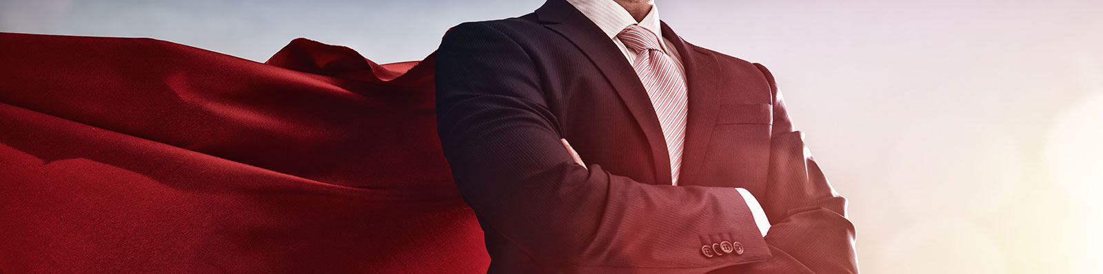 Man in suit with a cape
