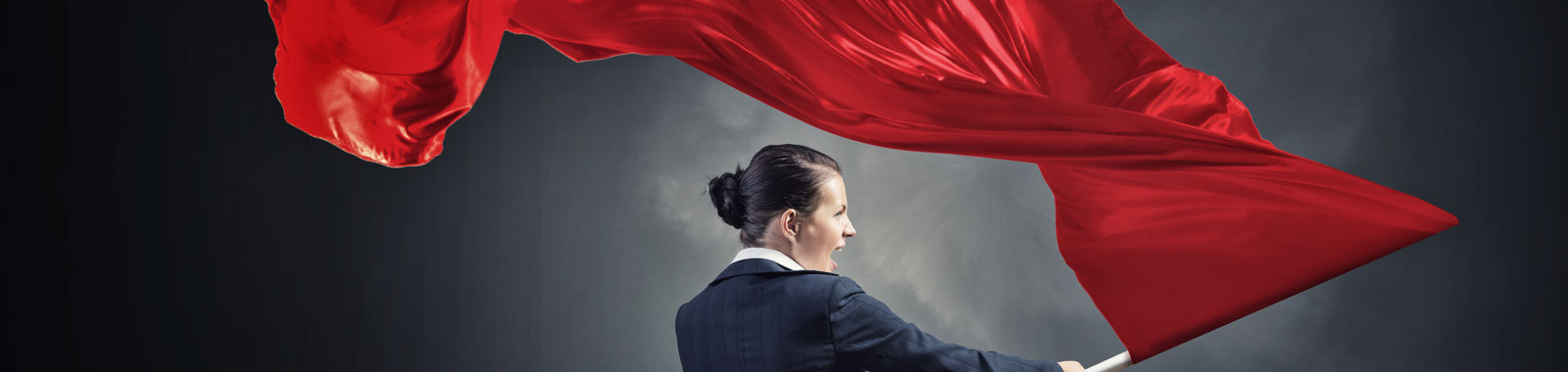 Woman waving a red flag